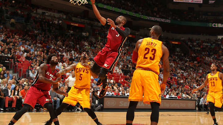 Wade reaches milestone, Heat roll past Cavaliers 122-101