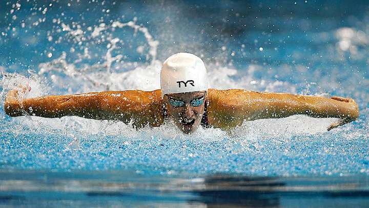 Vollmer’s incredible comeback rolls on, Ledecky clocks personal best