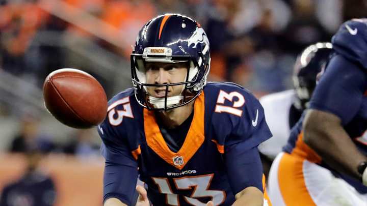 Broncos visit Titans as defending champs chase playoff berth