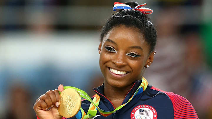 Simone Biles selected as closing ceremony flag-bearer