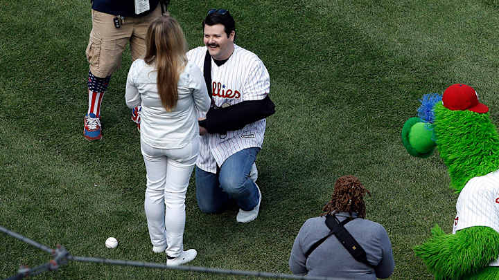 Watch: Wounded officer proposes to girlfriend after throwing first pitch Watch: Wounded officer proposes to girlfriend after throwing first pitch