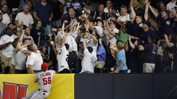 Shoemaker excels early, Angels stung by Yanks' power surge