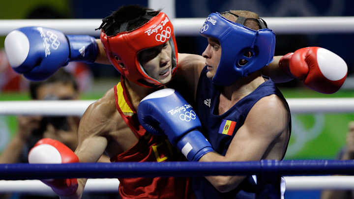 Olympic boxers to fight without headgear, worry about cuts