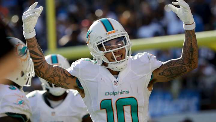 Alonso's pick-6 of Rivers lifts Dolphins to wild 31-24 win