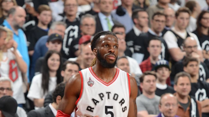 Carroll scores 21, Raptors beat Heat in OT to tie series
