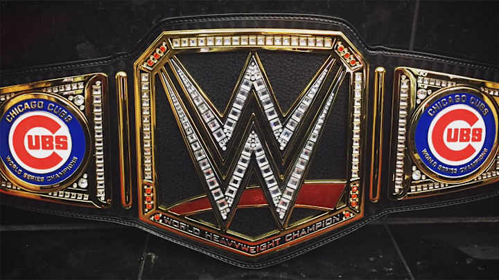 Kris Bryant is wearing a custom WWE title belt at the Cubs parade