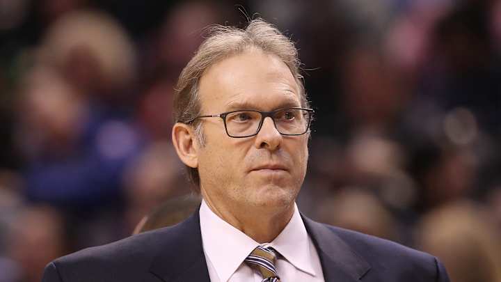 Kurt Rambis has a cup of coffee in his pocket for no apparent reason