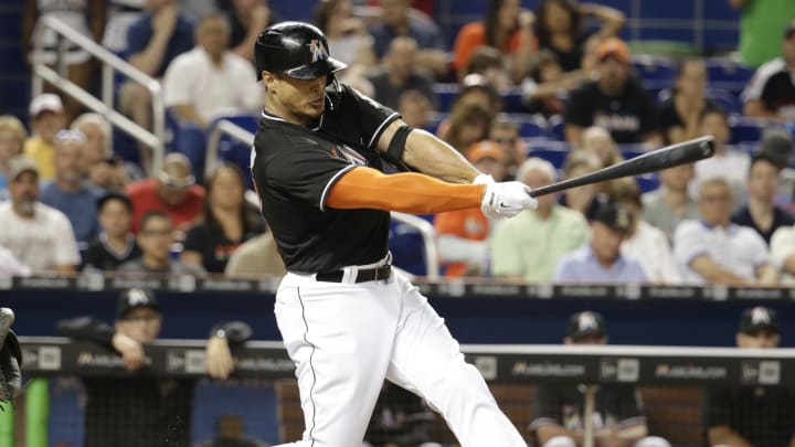 Grilli strikes out Stanton for save as Braves beat Miami 6-4