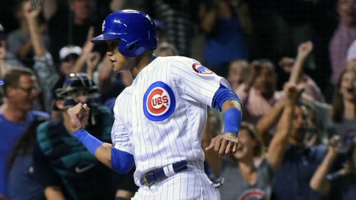 Lester squeezes in deciding run, Cubs beat Mariners in 12