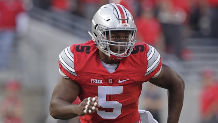 Raekwon McMillan gets leveled by Ohio State fan