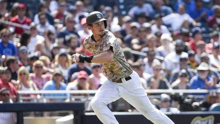 Wil Myers steals home while pitcher Homer Bailey has his back turned