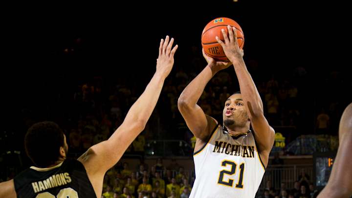 Michigan scores final 11 points to beat No. 18 Purdue 61-56