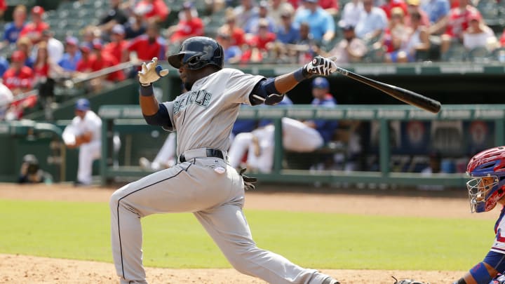 Odor homers twice, Gomez hits slam as Rangers rout Mariners