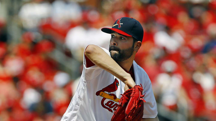 Triggs earns first win as Athletics power past Cardinals 7-4