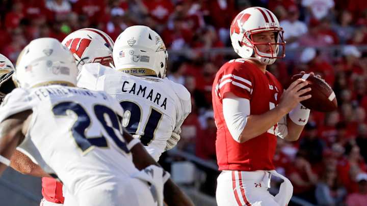 Maturing QBs to be tested when Michigan hosts Wisconsin