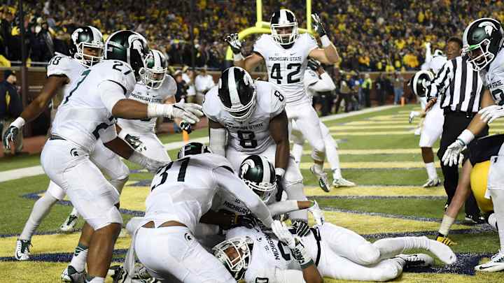 Jim Harbaugh learned several things from botched-punt loss Jim Harbaugh learned several things from botched-punt loss