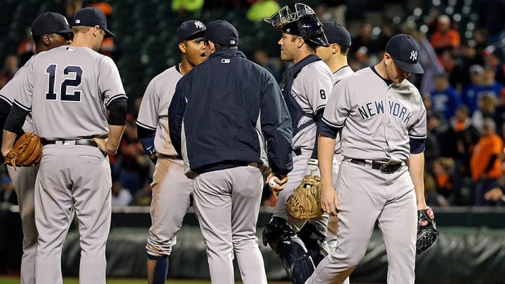 Tired bullpen logic costs Yankees in extras in Baltimore