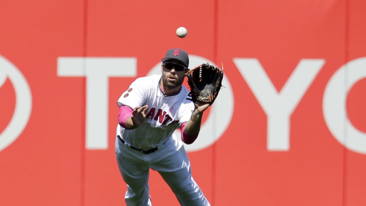 Arenado helps Rockies beat Giants 2-0