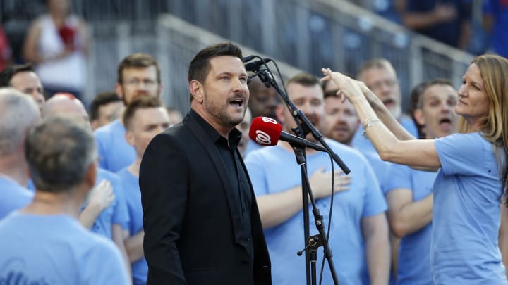 Bean speaks, A's go silent as MLB honors Orlando victims