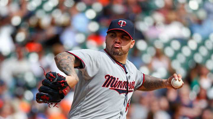 Santiago's pitching, Dozier's hit lifts Twins over Tigers