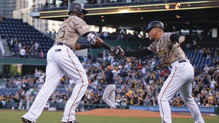 Polanco powers Pirates by Braves 8-2