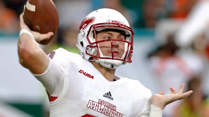 Walton runs for 4 TDs, No. 25 Miami tops FAU 38-10