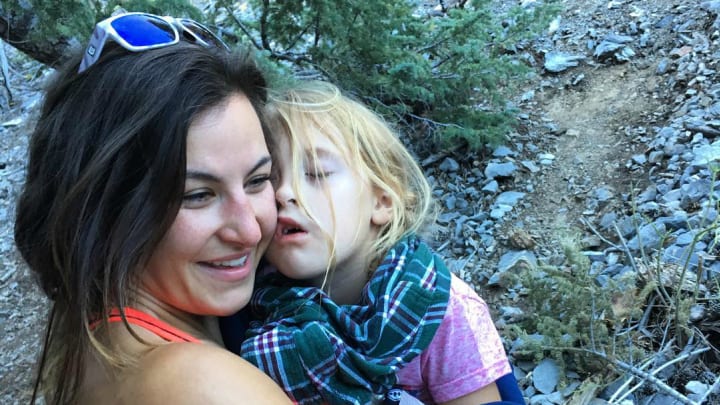 MMA fighter Miesha Tate carries injured six-year-old down mountain