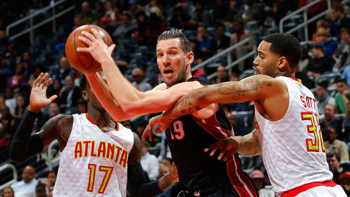 Deng has 30 points, short-handed Heat beat Hawks 115-111