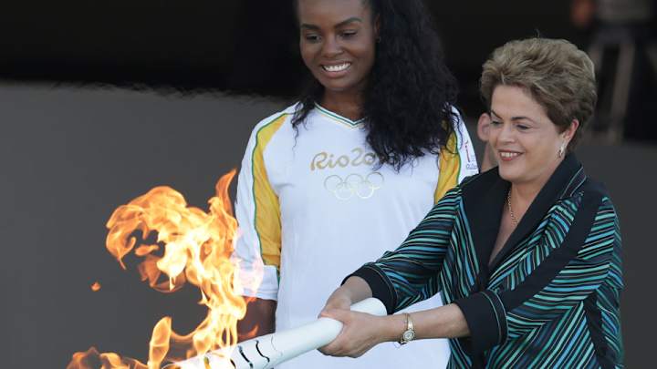 Watch: Olympic torch arrives in Brazil, lit by president Dilma Rousseff