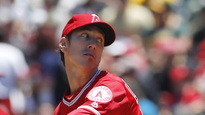 Lincecum wins in return to majors, pitches Angels past A's