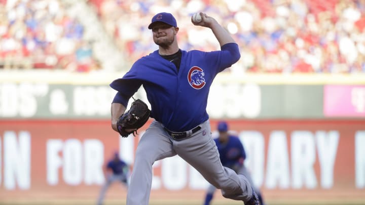 Cubs play 3 relievers in LF while beating Reds in 15 innings