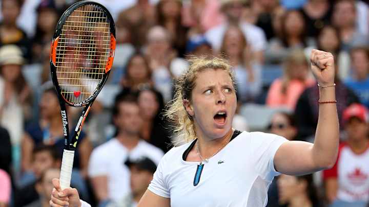 Teary finish: Radwanska holds off cramping Friedsam