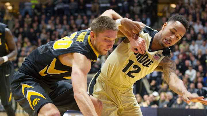 Iowa defense spurs rally for 70-63  upset at No. 14 Purdue