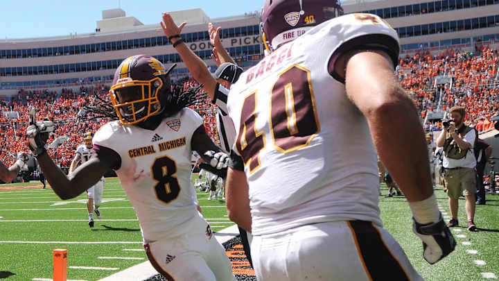 Officials' miscue, Hail Mary: Okla St stunned by CMU Officials' miscue, Hail Mary: Okla St stunned by CMU