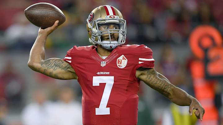 Colin Kaepernick sits out national anthem in protest of racial inequalities