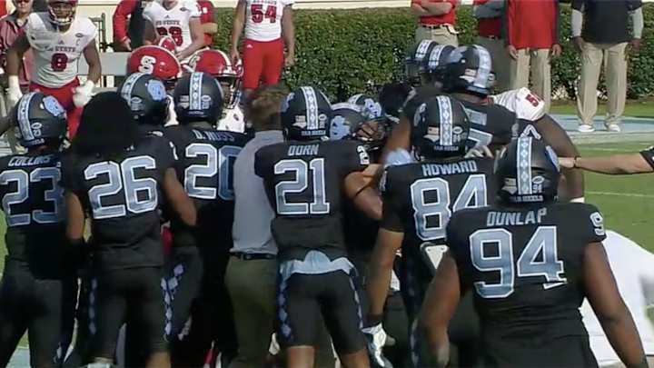 Watch: UNC and NC State brawl at midfield after bizarre fumble