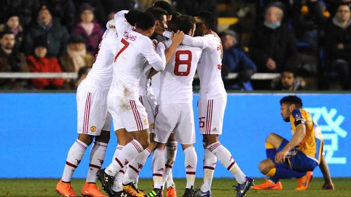 Manchester United eases by Shrewsbury in FA Cup