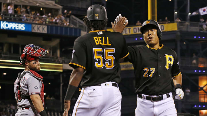 Votto powers Reds past reeling Pirates 8-7