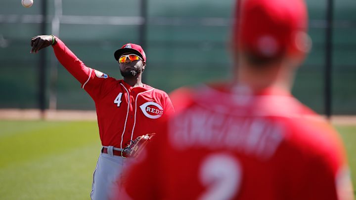 Despite offseason deals, Reds' Phillips back for 11th year