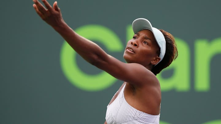 Venus Williams wins singles, loses doubles with Serena