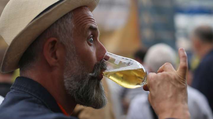 Nine Aussies arrested after celebrating F1 win by drinking beer from their shoes Nine Aussies arrested after celebrating F1 win by drinking beer from their shoes