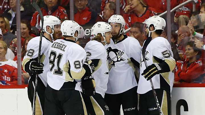 Down a man after Orpik hit, Pens top Caps 2-1; series 1-all Down a man after Orpik hit, Pens top Caps 2-1; series 1-all