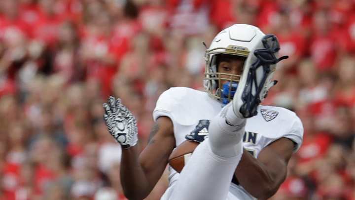 Clement scores twice, No. 10 Wisconsin stuffs Akron 54-10