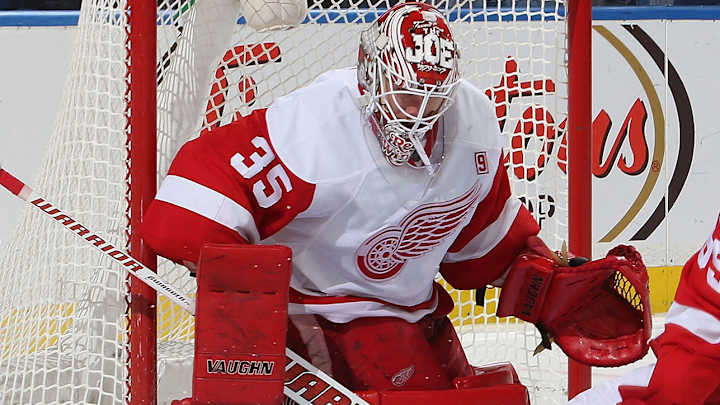 Red Wings goalie Jimmy Howard leaves vs. Devils with injury