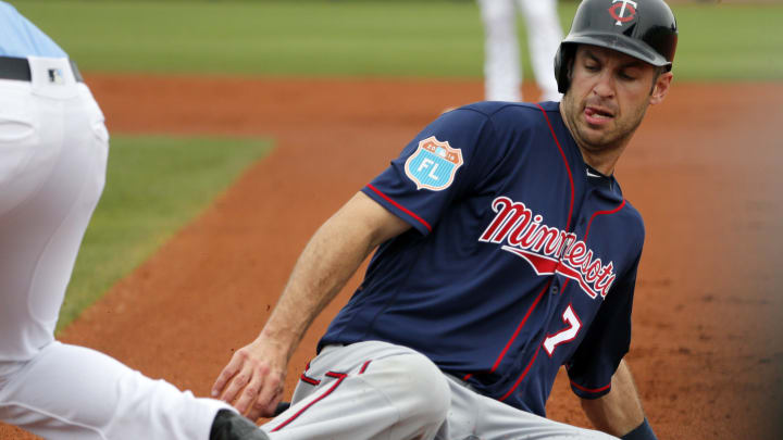 Santana sharp, Plouffe and Suzuki homer twice in Twins win