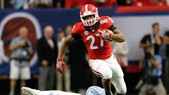 Chubb runs for 222 yards, Georgia beats NCarolina 33-24