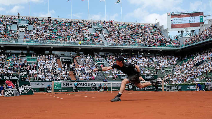 The Latest: Bouchard comeback fails vs. Bacsinszky at French