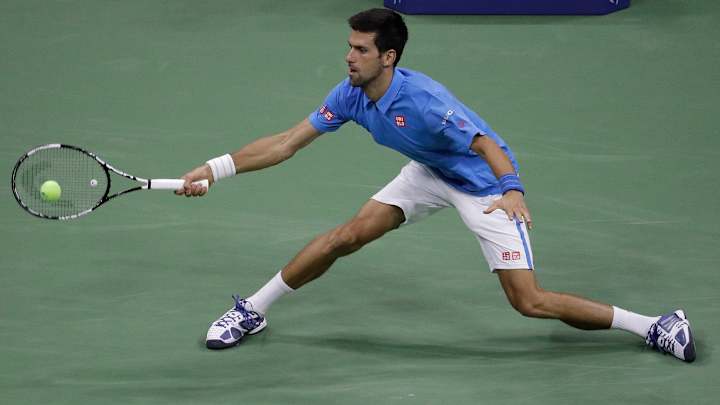 Djokovic moves on at US Open after injured Vesely withdraws