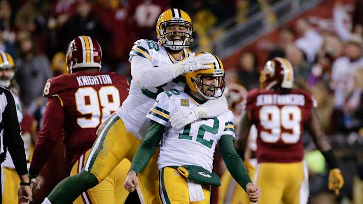 In playoff mode, Aaron Rodgers, Packers beat Redskins 35-18