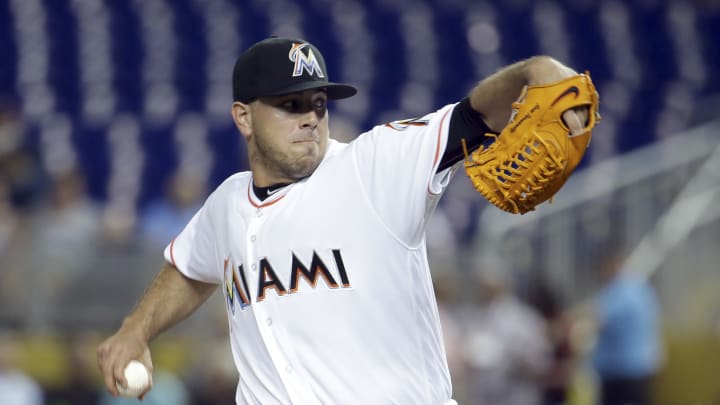 Fernandez helps Marlins snap Royals' 9-game winning streak